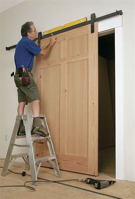 How To Hang An Interior Barn Door Track System | Cabinets Matttroy