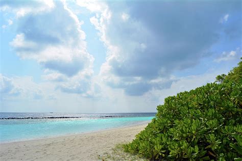 Beautiful beach in the Maldives with blue clear water #1 Photograph by ...