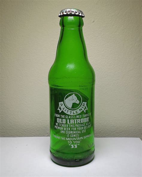 1969 Rolling Rock Beer Bottle (2) | Year Made: 1969 Glassmak… | Flickr