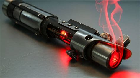 Download Sith Red Lightsaber Wallpaper | Wallpapers.com