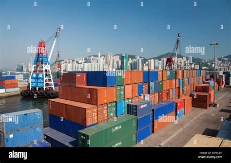 Large stacks of shipping containers on dock in Hong Kong Harbour on a ...