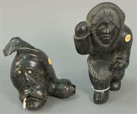 Two Inuit Eskimo figural carvings including Thomas Suvaaraq (1935 ...