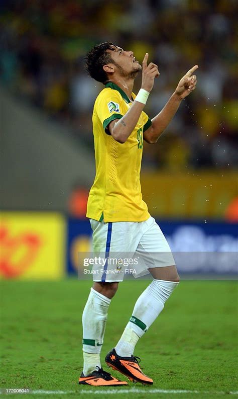 Neymar of Brazil celebrates scoring his team's second goal to make ...