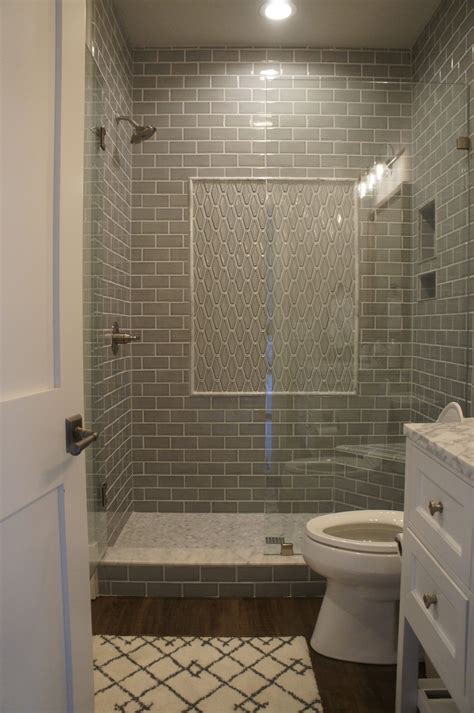 Gray subway tile shower with framed accent panel | Shower tile, Subway ...