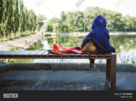 Sad Kid Sitting Alone Image & Photo (Free Trial) | Bigstock