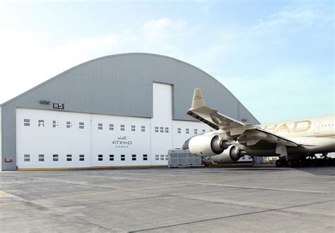 Fabric fold-up hangar doors for aircraft hangars in all sizes ...