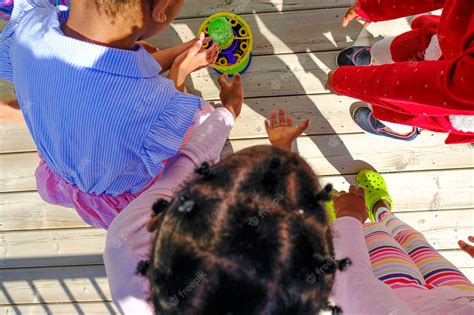 Premium Photo | African american nigerian children playing with bubble ...