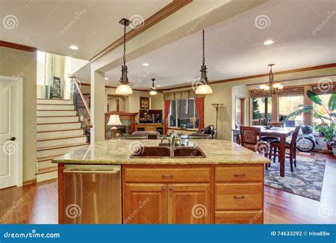 Open Floor Plan. View of Kitchen Island with Sink Stock Photo - Image ...