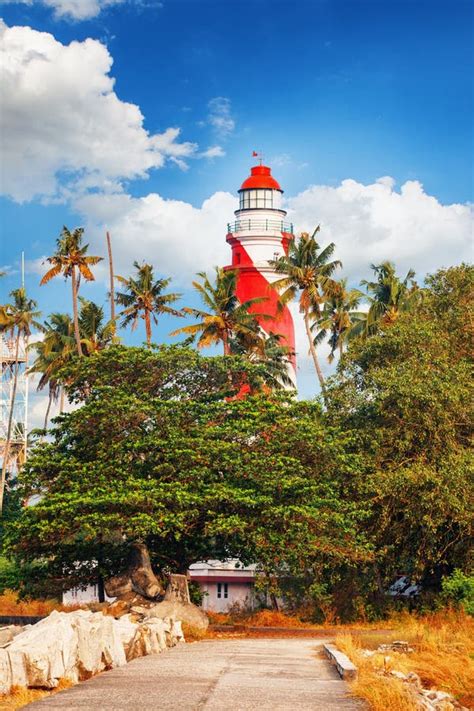 Thangassery Lighthouse Cliff Surrounded by Palm Trees and Big Sea Waves ...