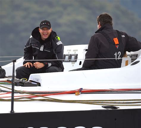 Michael Clarke chats to a fellow crew member onboard a racing yacht ...