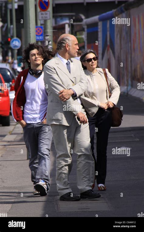 John Malkovich and his family visit the 'Eastside Gallery', the remains ...