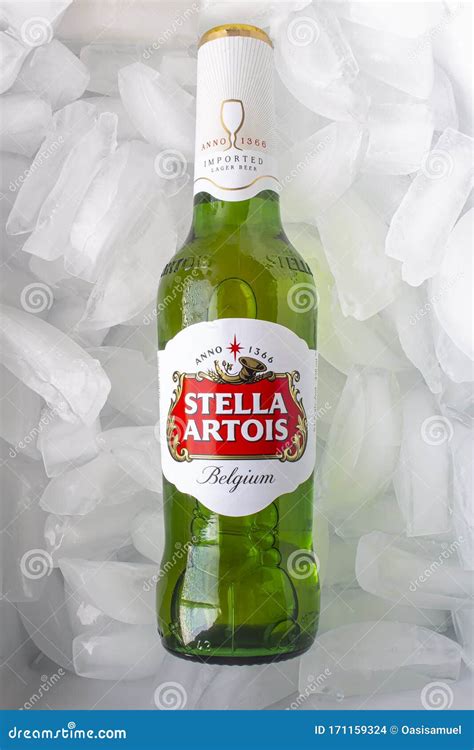 A Bottle of Stella Artois Beer Bottle on Ice Editorial Stock Image ...