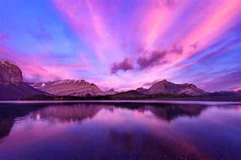 Mountains surrounded by water under purple skies, kananaskis HD ...