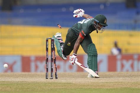 Tanzid Hasan survived this run-out attempt but didn't last much longer ...