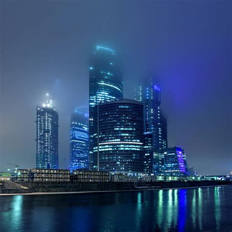 Moscow City In Myst At Night Photograph by Alex Sukonkin