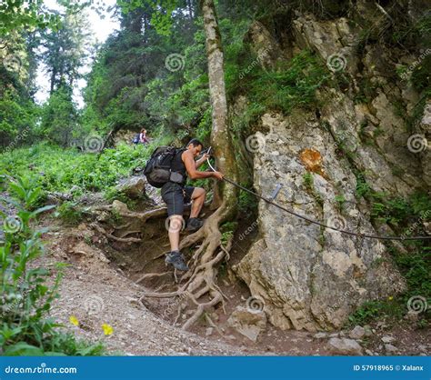 Hikers on a Perilous Trail, Holding the Safety Line Stock Image - Image ...