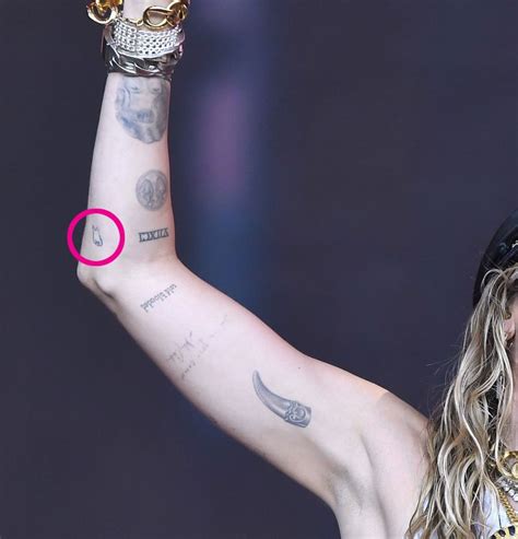 Miley Cyrus Tattoos: Complete Breakdown Of Ink Designs' Meanings