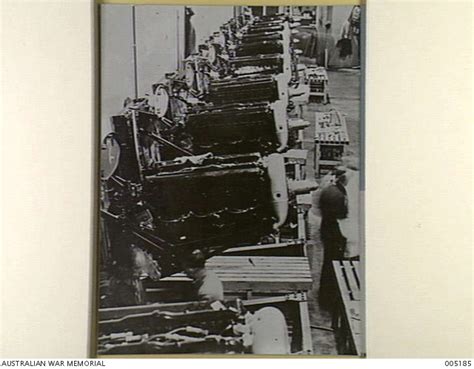 LONDON - A ROW OF ROLLS ROYCE MERLIN ENGINES AT AN AIRCRAFT FACTORY ...