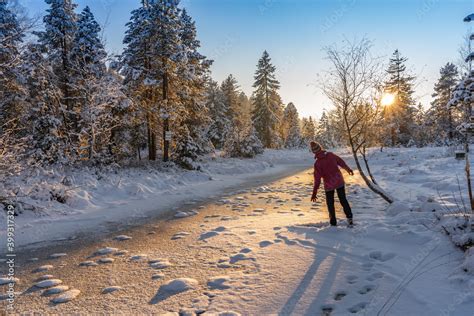 winter landscape, sunset sky, having fun outside, jumping people, woman ...