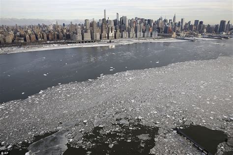 Hudson River freezes as Manhattan is encased in worst ice for a decade ...