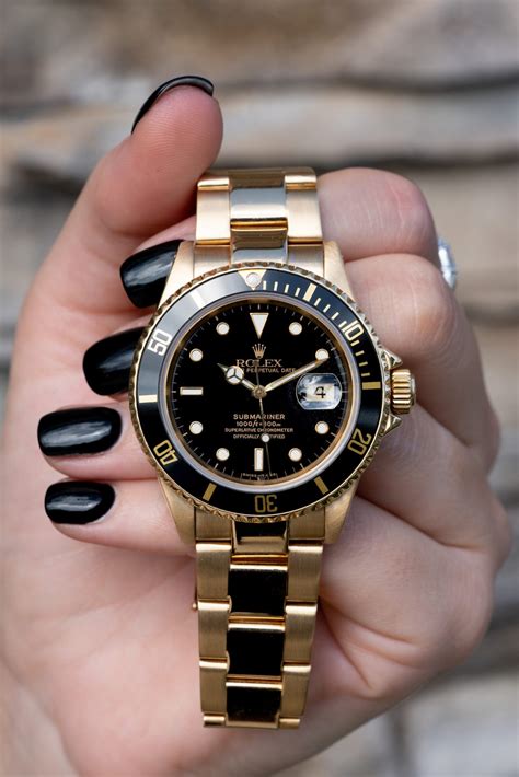 Hands-On Review: Rolex Submariner 16618LN Yellow Gold Black Dial ...