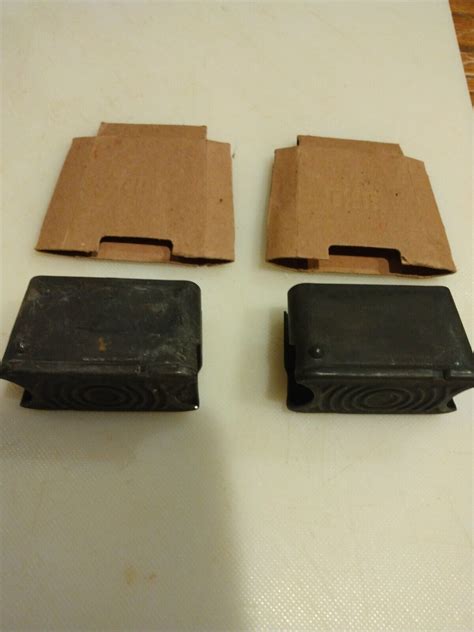 TWO ORIGINAL M1 GARAND ENBLOC 8 ROUND CLIPS UNMARKED, WITH COVERS ...