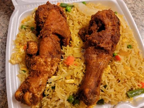 Spicy Fried Rice and Chicken from Ghana Stock Image - Image of african ...