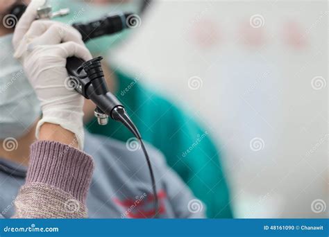 Bronchoscope In The Doctor`s Hand During The Procedure Royalty-Free ...