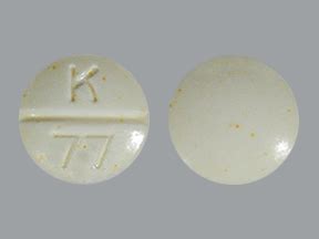 K 77 Pill Images (Yellow / Round)