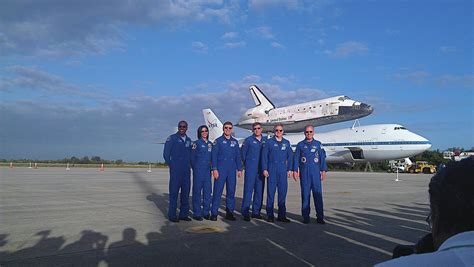 Discovery and Crew and Shuttle Carrier Aircraft Photograph by Heron And ...