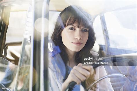 Woman Driving Vintage Car High-Res Stock Photo - Getty Images