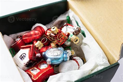 Christmas decorations in a box 12660339 Stock Photo at Vecteezy