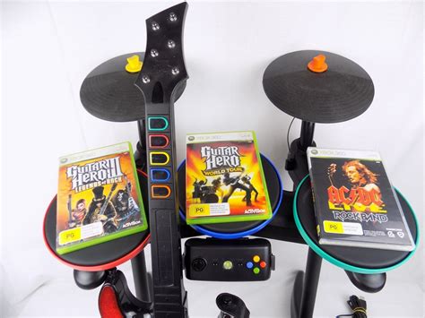 Like New Xbox 360 Guitar Hero Band Hero Bundle Drum + Guitar + 3x Games ...