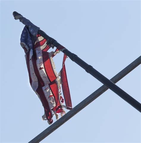 Photos of tattered flag draw condemnation — and quick action | News ...