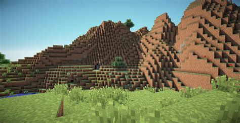 an image of some rocks and grass in minecraft