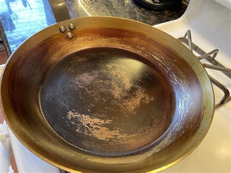 First time seasoning a Carbon steel pan! Is this darker middle area ...