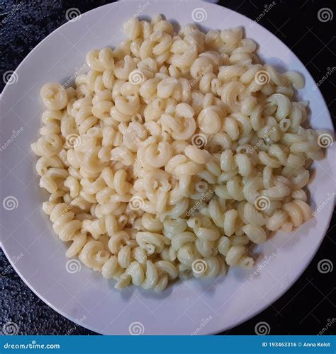 Overcooked Pasta Horns Sprawled On A Plate Stock Photo | CartoonDealer ...