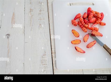 oca tubers being prepared for cooking in a kitchen Stock Photo - Alamy