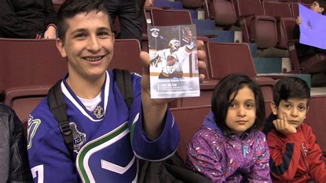 Alan Kurdi's family experiences Canadian culture with Canucks - YouTube