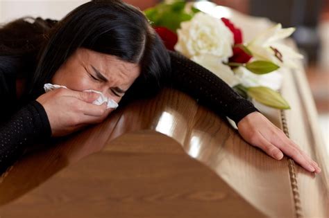 Premium Photo | People and mourning concept - crying woman with coffin ...