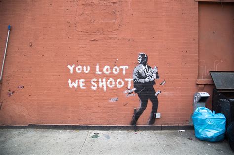 “You Loot, We Shoot” by Banksy in New York City