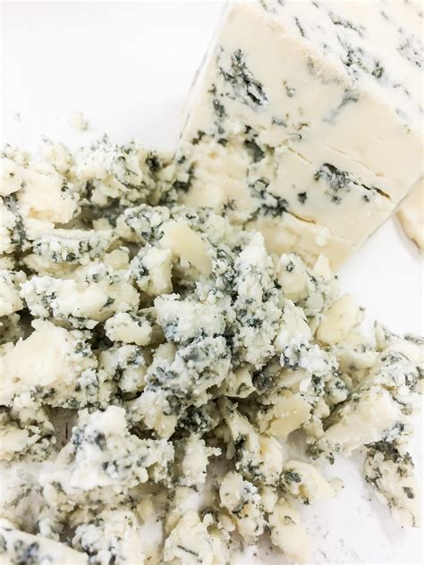 Soft Crumbled Blue Cheese with White Background - Tony's Meats & Market