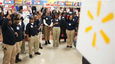 Corporate Uniform: The style of dress for Walmart employees exemplifies ...