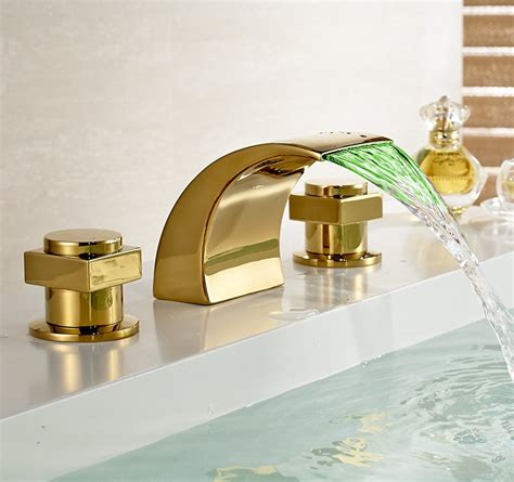 Gold Bathroom Faucets : Gold Bathroom Faucet Photograph - Gold-plated ...