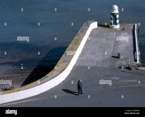 Lighthouse at Peel Harbour, Isle of Man Stock Photo - Alamy