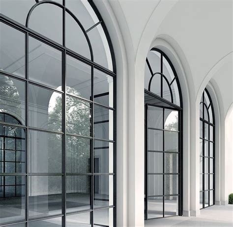 Black steel arched windows | Steel doors and windows, Arched windows ...