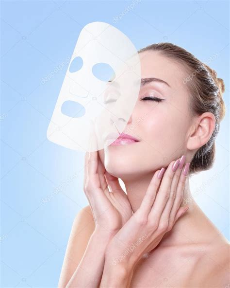 Young woman with cloth facial mask — Stock Photo © ryanking999 #44659811