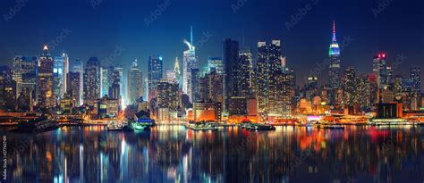 Panoramic view on Manhattan at night, New York, USA Stock Photo | Adobe ...