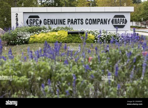 A logo sign outside of the headquarters of the Genuine Parts Company ...