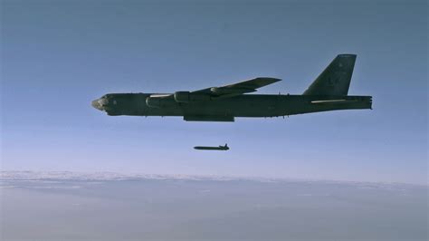 An unarmed AGM-86B air-launched cruise missile is released from a B-52H ...